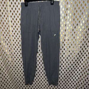 Fabletics the one jogger active taper windbreaker grey size L